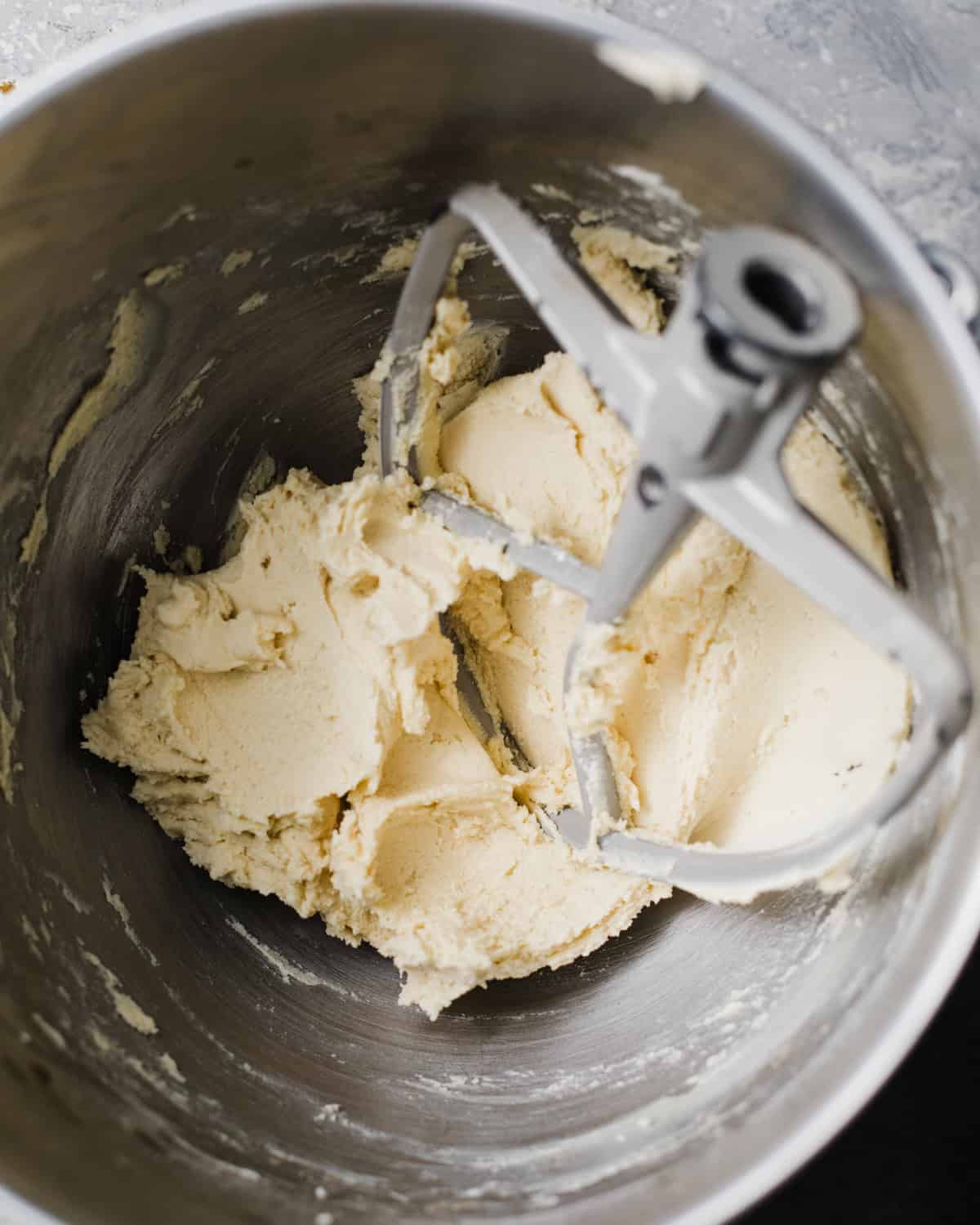 thumbprint cookie dough in the bowl of a stand mixer.