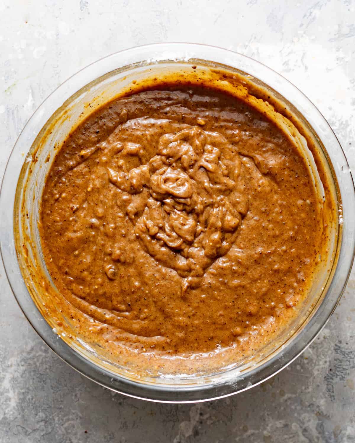 sticky toffee pudding cake batter in a mixing bowl.