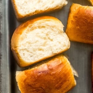 hawaiian rolls on a serving plate.