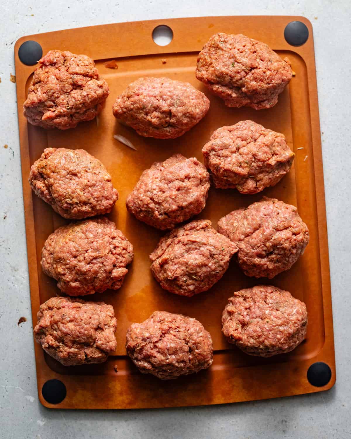 ground beef shaped into patties to form the hamburger steaks.