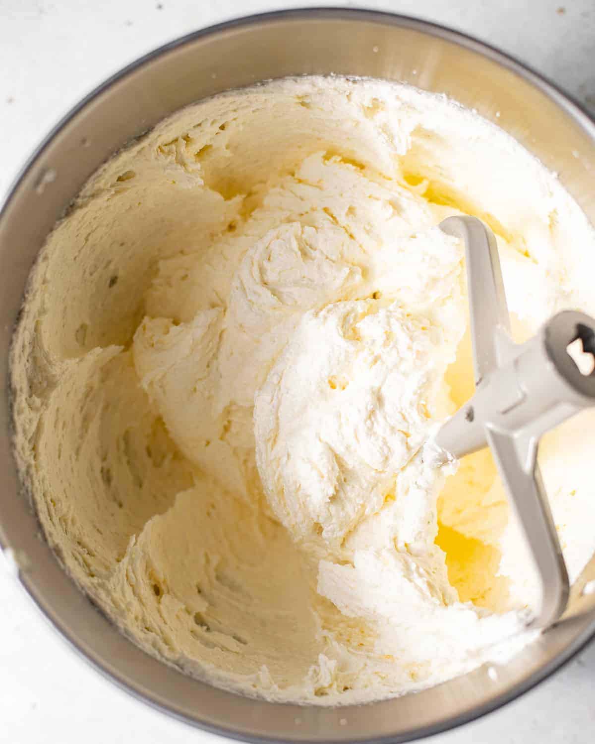 cake batter in a mixing bowl with the paddle attachment. 