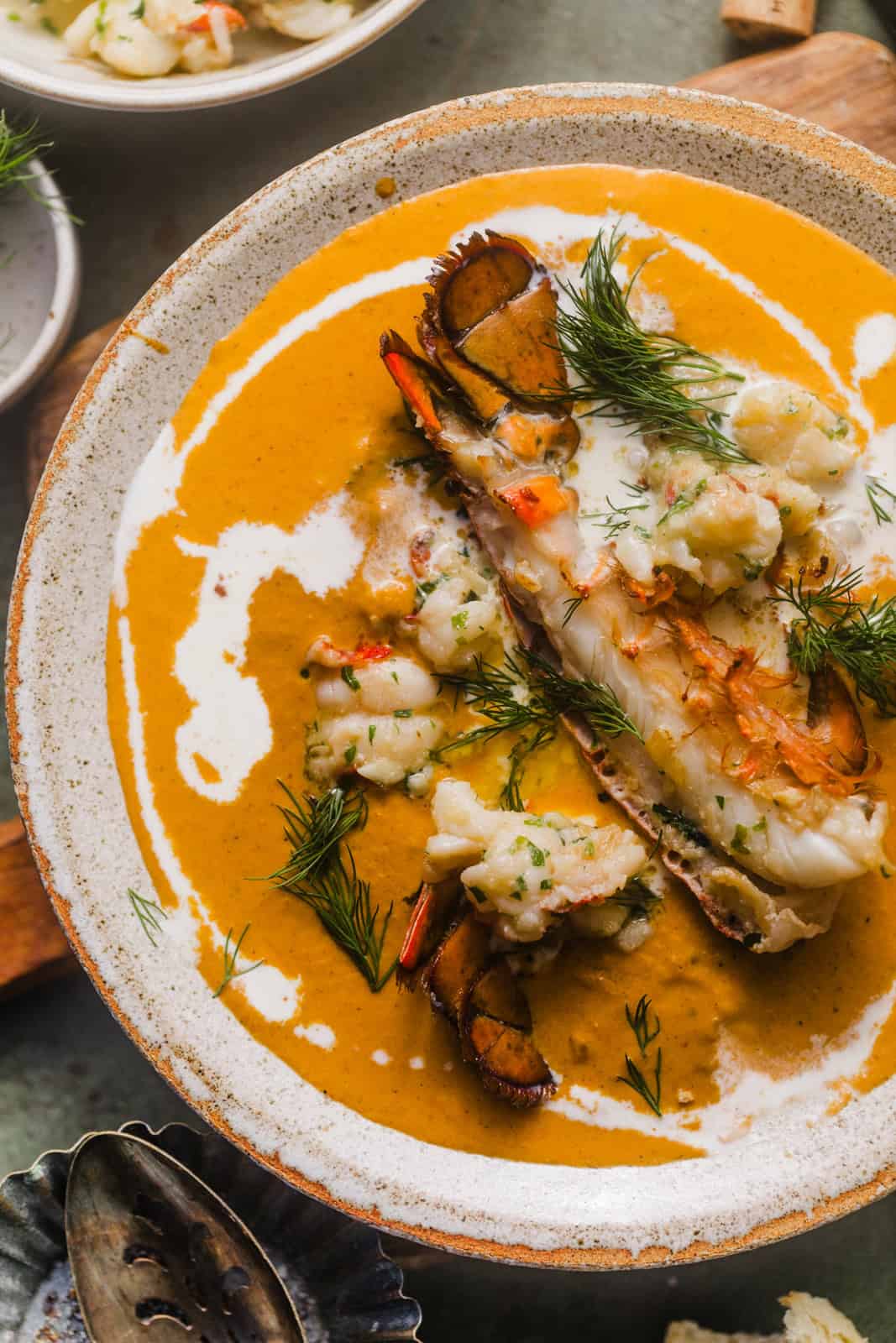 overhead photo of lobster bisque in a bowl. 