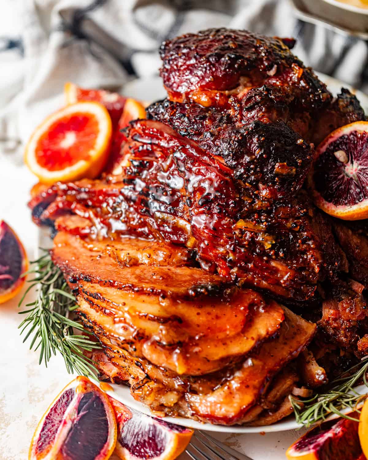 brown sugar mustard glazed ham on a plate.