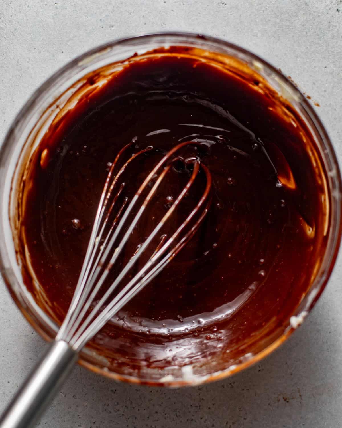 chocolate glaze whisked together in a bowl. 