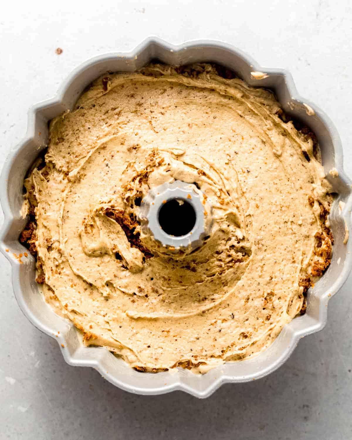 peanut butter pound cake batter in a bundt pan. 