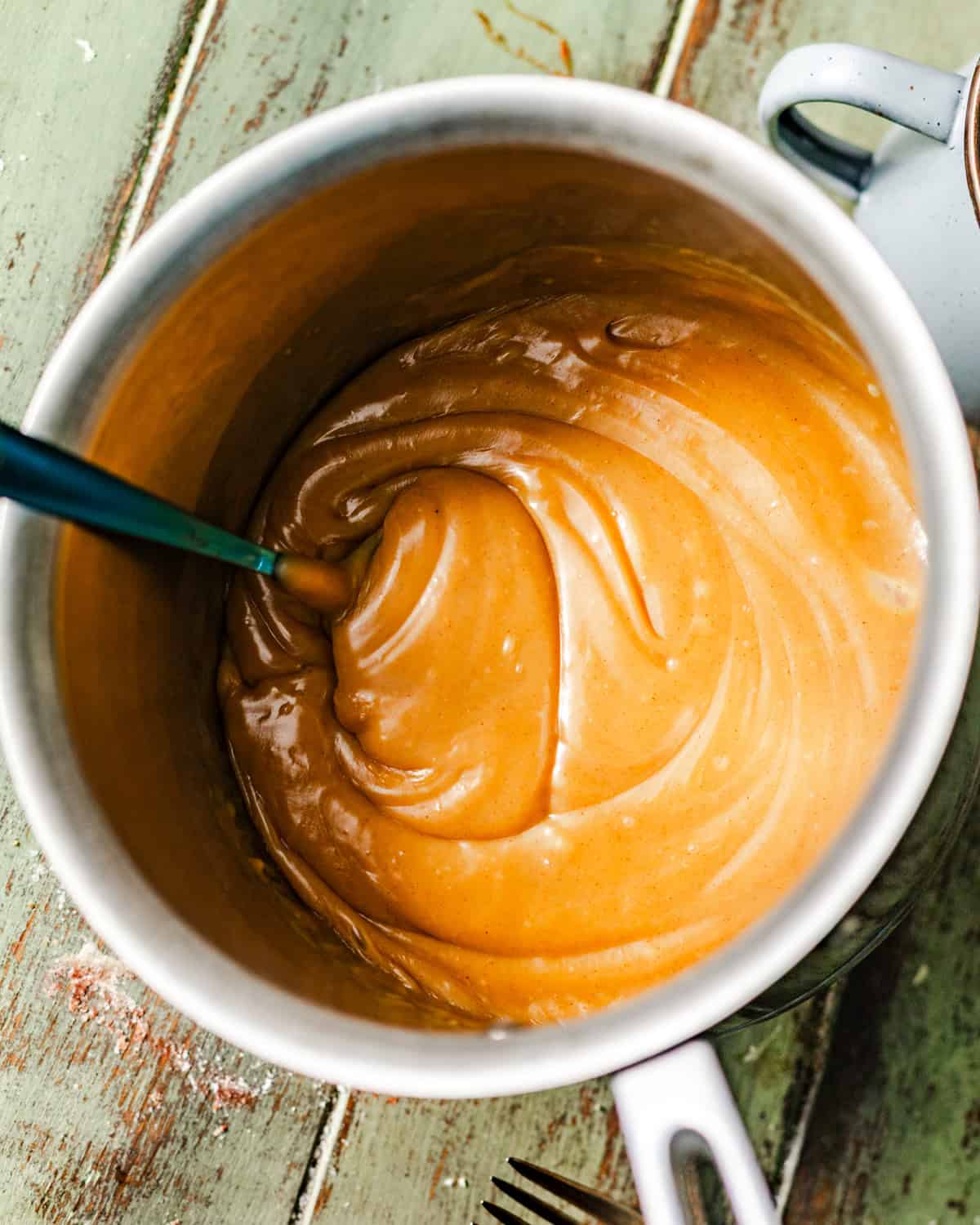 peanut butter fudge frosting in a saucepan. 