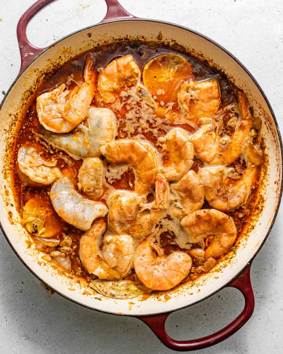 shrimp cooking in the butter sauce until pink and just slightly curled.