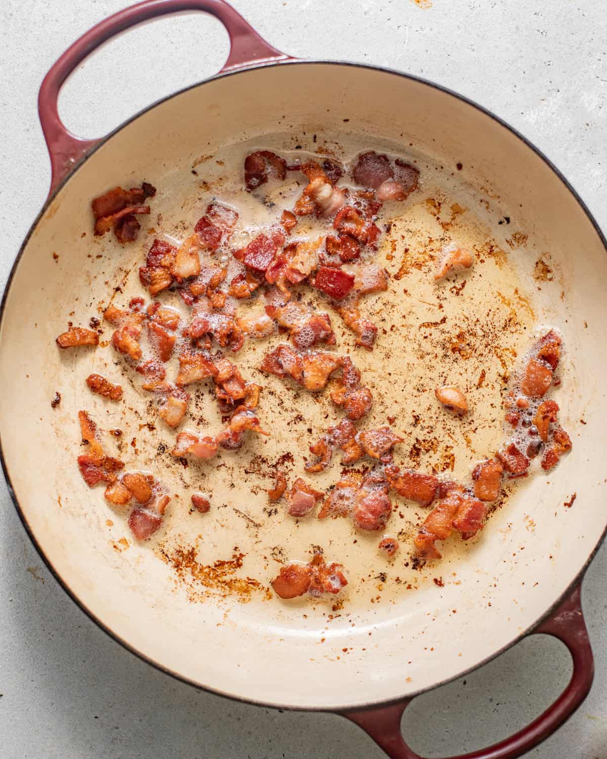 bacon cooked until crispy in a large skillet.