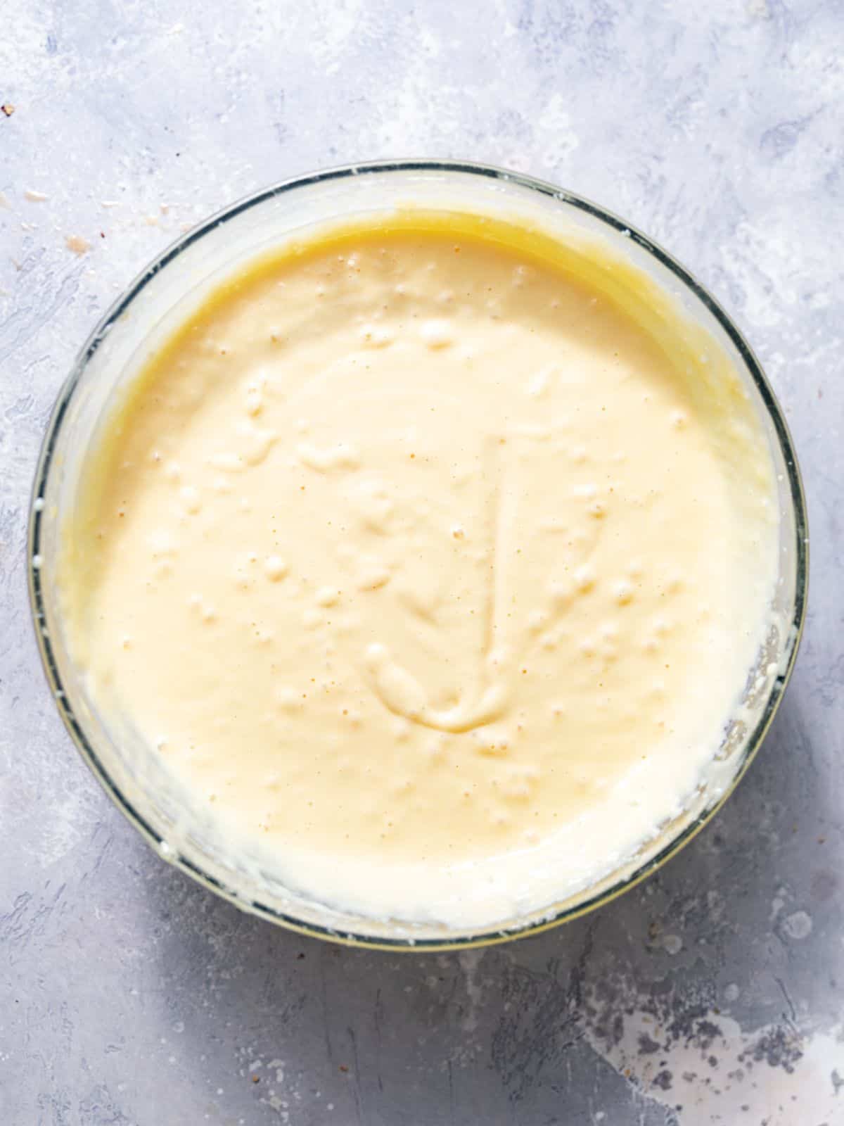 creamy lemon filling mixed together in a large mixing bowl. 