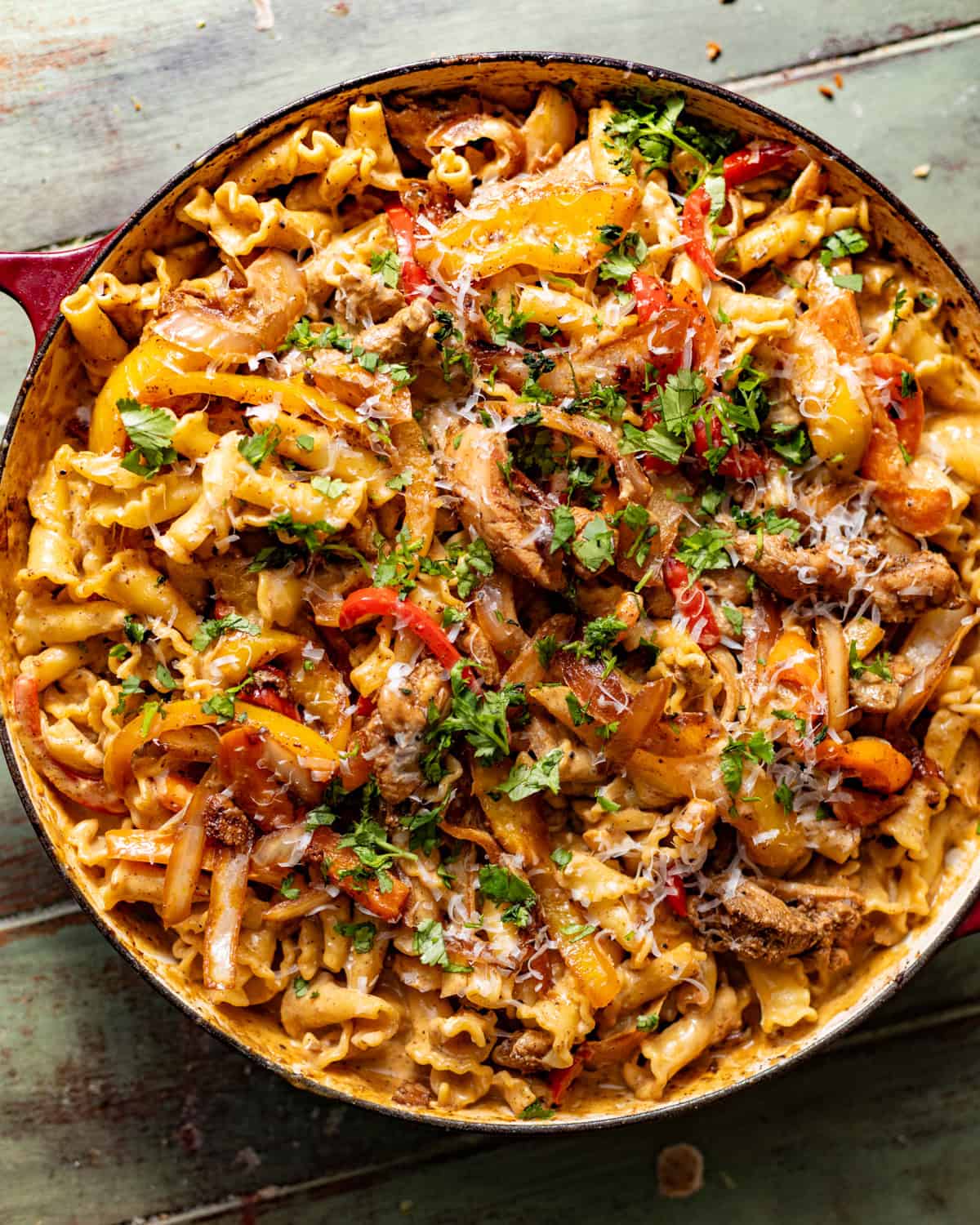 finished rasta pasta in a large skillet topped with fresh cilantro. 