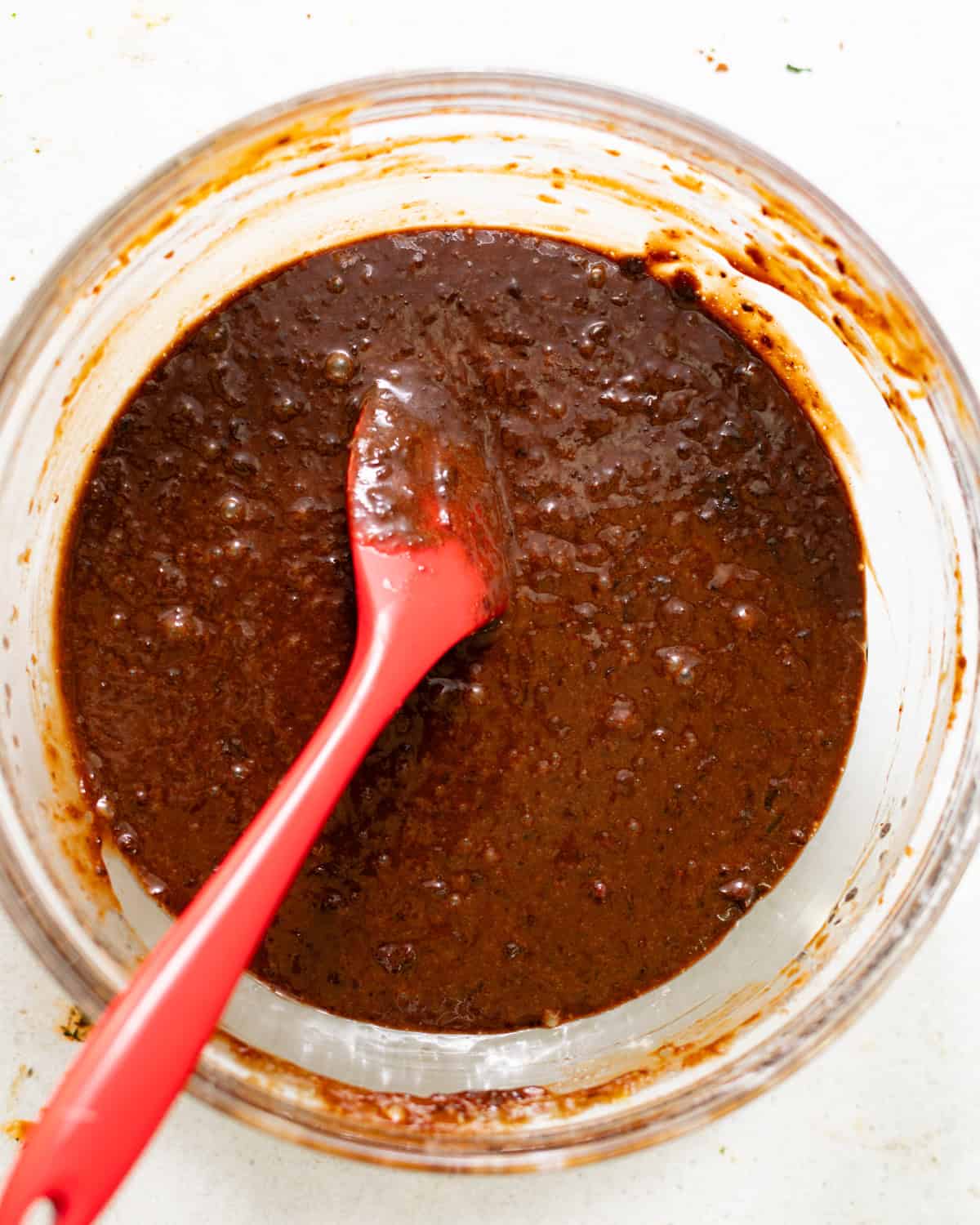 chocolate sticky toffee pudding batter in a bowl.