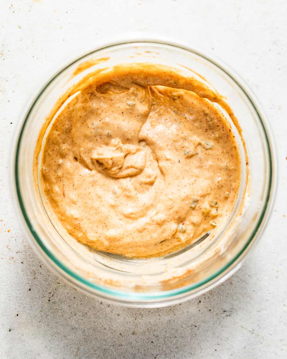 Cajun tartar sauce mixed together in a bowl.