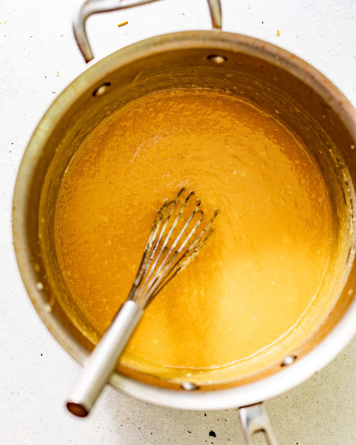 coconut caramel frosting in a saucepan.
