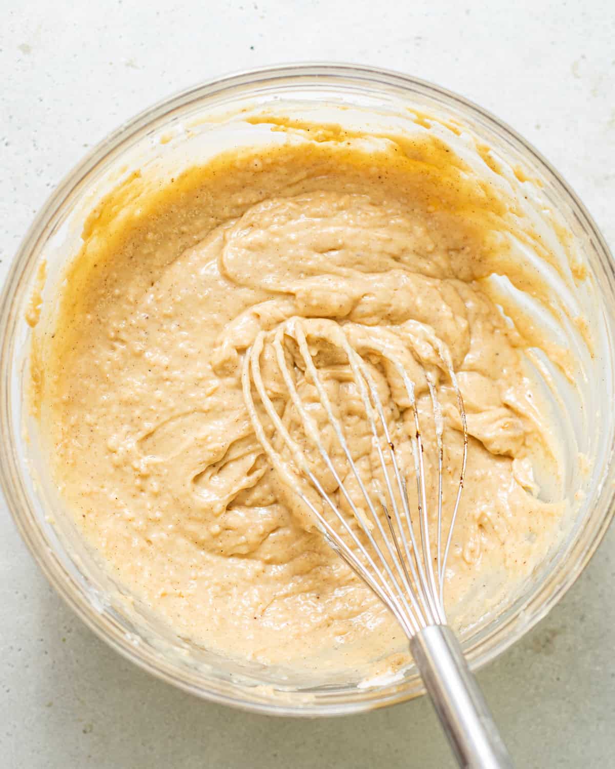 cake batter whisked together in a bowl.