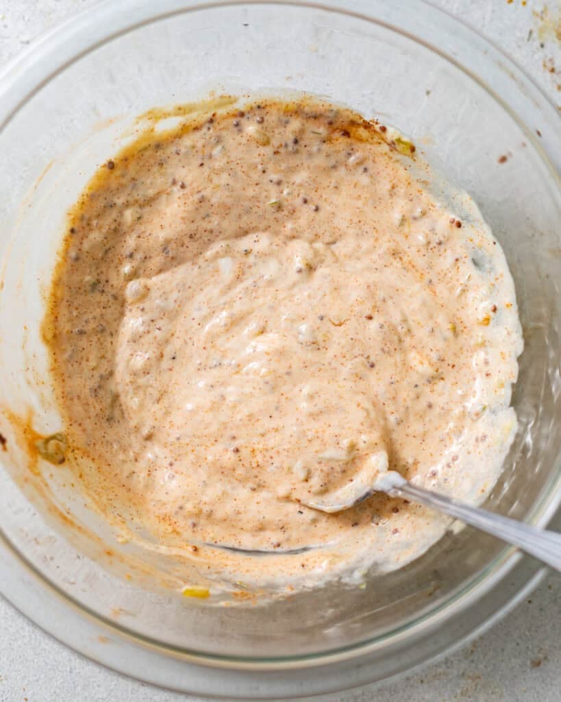 Creole tartar sauce mixed together in a bowl.