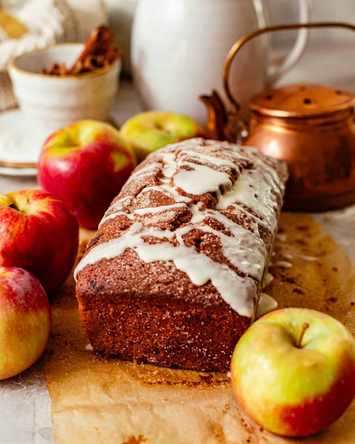 apple cider donut loaf covered in a apple cider glaze.