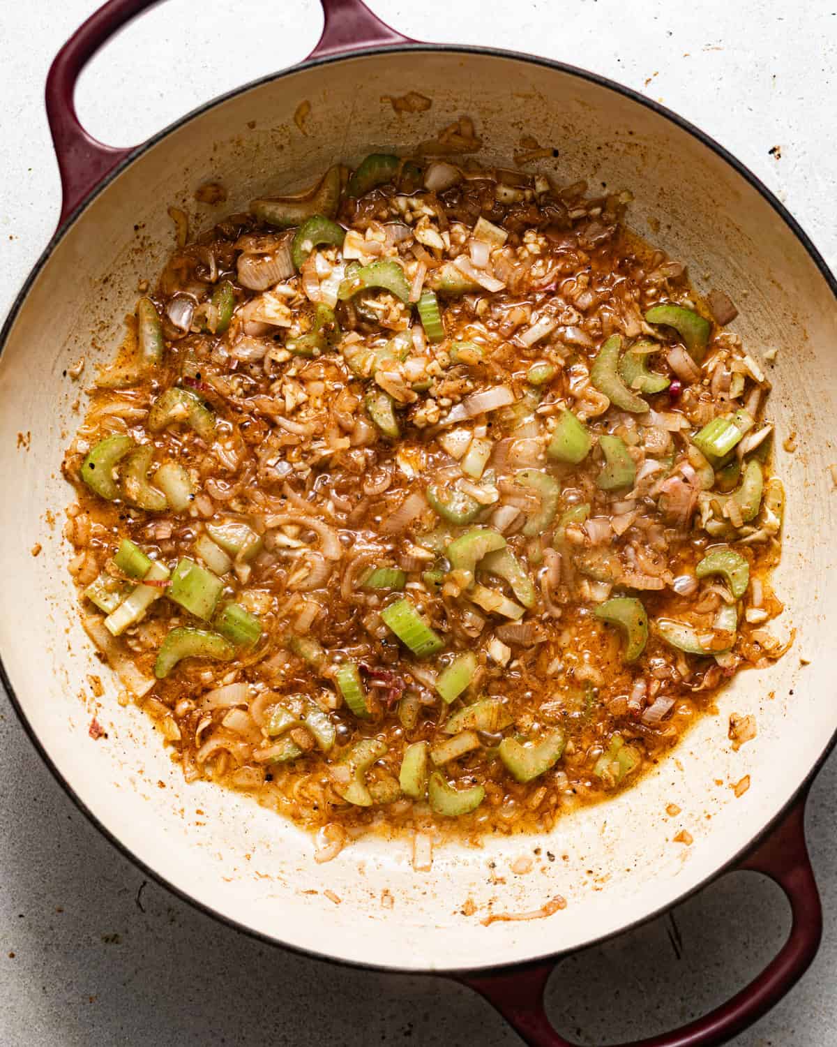 celery, shallots, seasonings, and garlic in a large pot sauteed in butter.