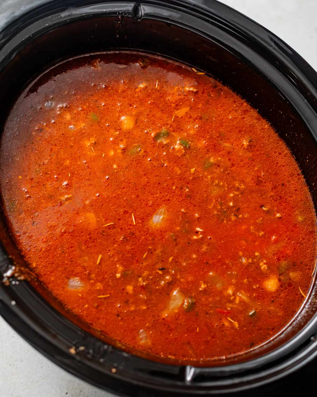 meat sauce in a slow cooker with beef broth.